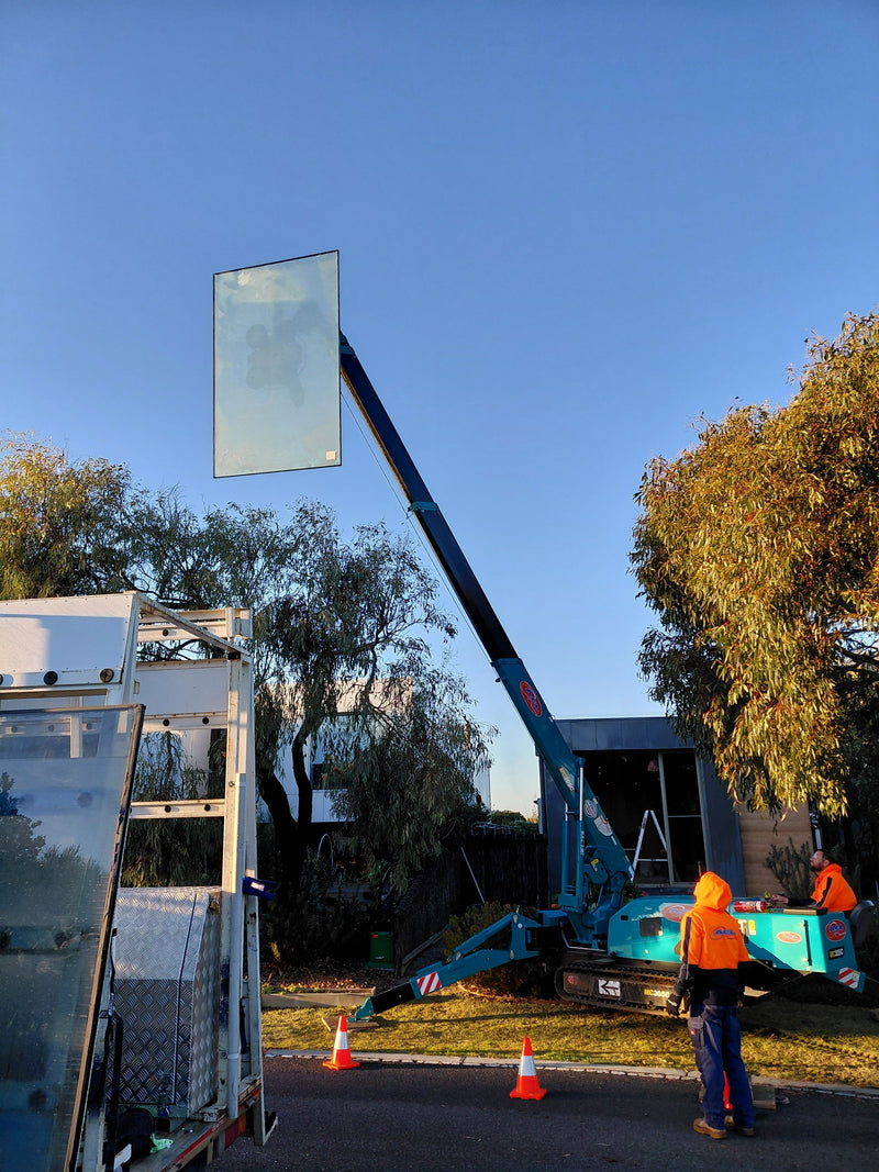 Craning a 140 kg Double-Glazed Unit Over a Nine-Metre Garden