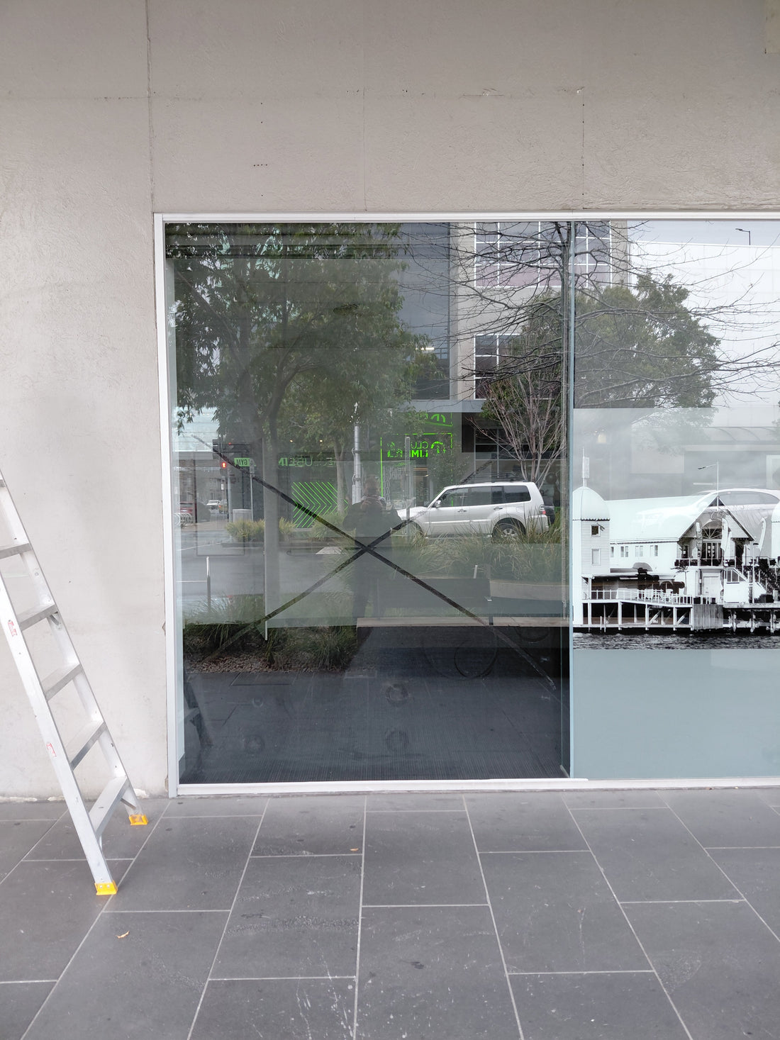 Completed shopfront glass replacement at a Commonwealth Bank branch