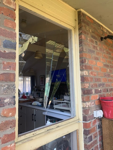 A Hand Through an Awning Window in Jan Juc, and a Trip to Hospital