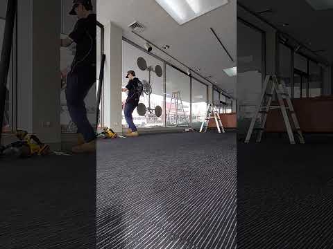 Reverse glazing a 200 kg window panel in Colac using a Jekko mini crane