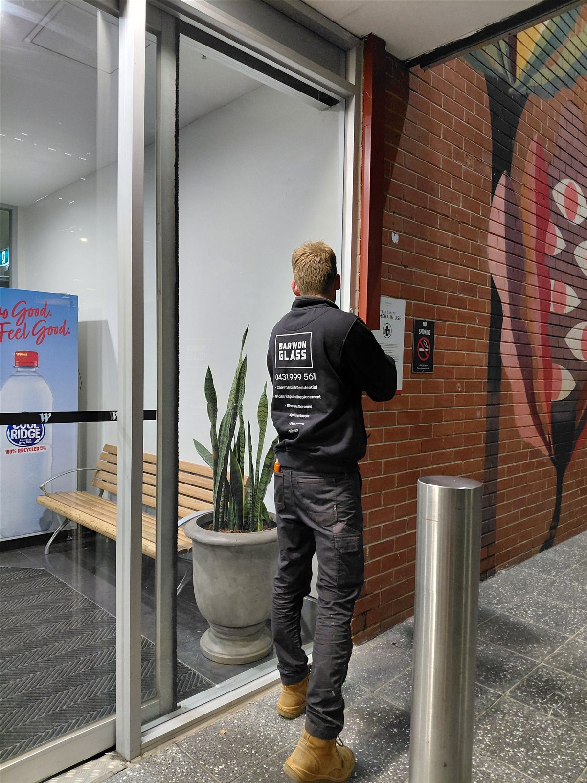Boarded-up shopfront after an emergency glass board-up by Barwon Glass