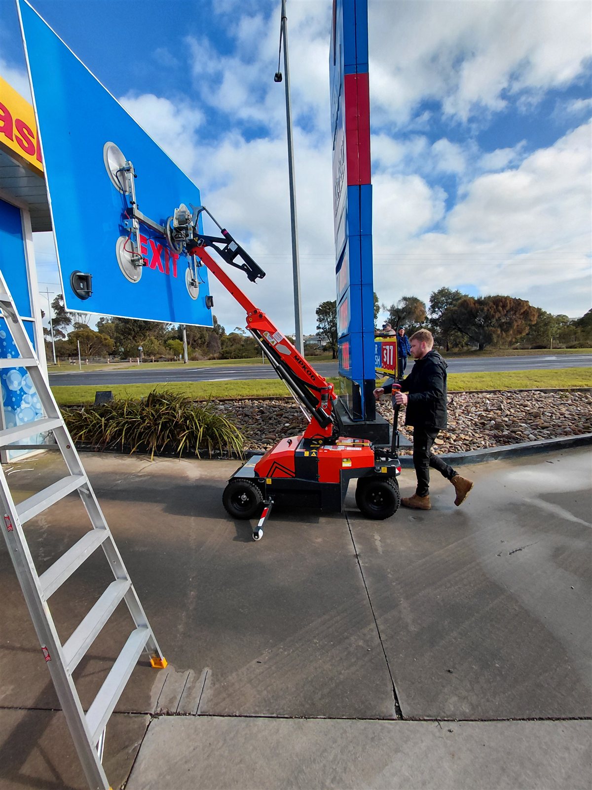 Barwon Glass technician repairing a smashed shopfront window